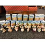 A Collection of 18 Royal doulton The Doultonville collection includes the farmer , the school
