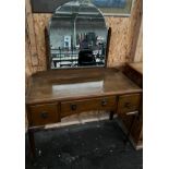 Vintage oak three drawer dressing table supported on queen anne legs and comes with a fitted mirror