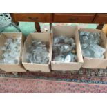 Four boxes of crystal and glass wares.
