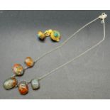 Silver 925 chain with attached Orange and green agate stone pendants. Together with a pear of