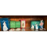 A shelf of Royal and Beswick figures includes gardener rabbit, Doulton figure joy, Royal doulton