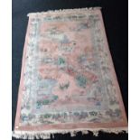 A Large Asian Wool Rug L 300 x W184