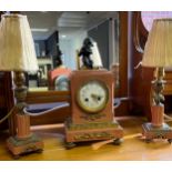 19th century pink marble, bronze and gilt metal mounted mantel clock with matching side table lamps.