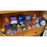 Shelf of art glass includes Caithness