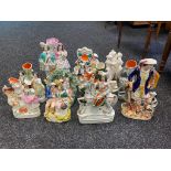 A collection of antique Staffordshire figurines together with Three Graces Greek nude Parion ware