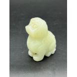 Antique Chinese hand carved pale green jade seated foo dog sculpture. [8cm high]