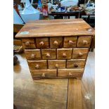 A small Mexican pine multi drawer chest.
