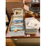 A Shoebox of old and vintage postcards together with a selection of albums of cigarette cards