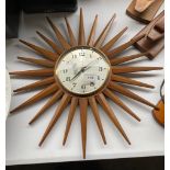 A Mid century sunburst wall clock by Eurostyle