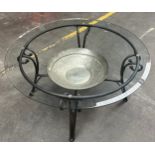 Interior metal and glass lounge table.