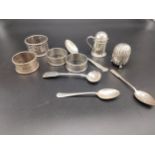 A Collection of silver marked items to include four napkin rings, Two silver pepper pots,