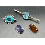 A Lot of vintage jewellery to include Silver bar brooch set with a large blue stone, white metal and