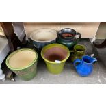 A Selection of plant pots and water jugs etc