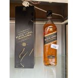 A Bottling of Johnnie Walker Black Label Blended Scotch Whisky, comes with box.