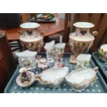 A Tray of 19th century porcelain items to include Early Derby urn vases, small urn and bowl. Also