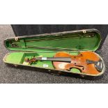 Antique violin, two bows and coffin case.