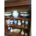 Three shelves of collectable porcelain to include Shelley art deco bulbous vase, Limoge style