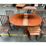 A Selection of mid century furniture to include Drop end table with four chairs, Nest of three