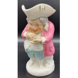19th century Character Toby Jug of a man taking snuff. [Signed JP] [Restored to hat area] [24cm