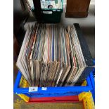 A Box of mixed genre records.