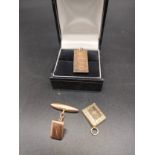 9ct gold ingot pendant, 9ct gold bible charm and 9ct gold cufflink [6.27Grams]