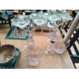 A Pair of glass candlesticks, two crystal pouring mugs and art glass