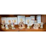 Shelf of Royal Albert Beatrix potter figures includes the Christmas stockings, old Mr brown, pigling