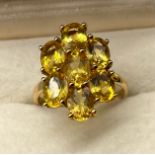10ct yellow gold ladies ring set with 7 large yellow Tourmaline stones. [3.85grams] [Ring size P]