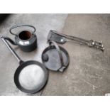 Selection of antique cast kitchen items along with fire companion set