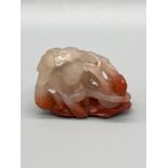 Antique Chinese Jade/ Agate sculpture of a seated figure. [4.5cm in length]