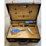 Antique/ vintage leather travel case containing Silver and blue enamel lidded preserve pots and hand