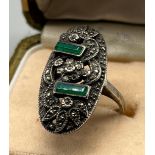 Art Deco silver ladies ring set with two green stones and marcasite stones. [Ring size I]