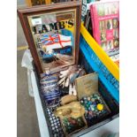 Box of interesting items includes marbles , silver over laid vase , lamb pub mirror etc