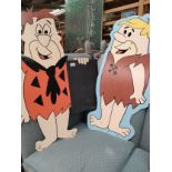 Fred Flintstone and Barney rubble restaurant advertising boards