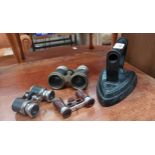 A lot of vintage binoculars and iron