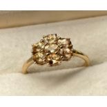 10ct yellow gold ladies ring set with pink spinel stones. [Ring size P] [2.32Grams]