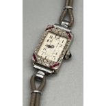 Art Deco design 18ct white gold and Platinum ladies cocktail watch, designed with ruby stones and