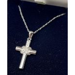 9ct white gold and diamond cross pendant with a 9ct white gold necklace. [4.18grams]