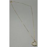 9ct yellow gold heart shaped pendant and 9ct yellow gold necklace. [1.35grams]