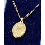 9ct yellow gold locket and 9ct yellow gold curb chain. [3.48grams]