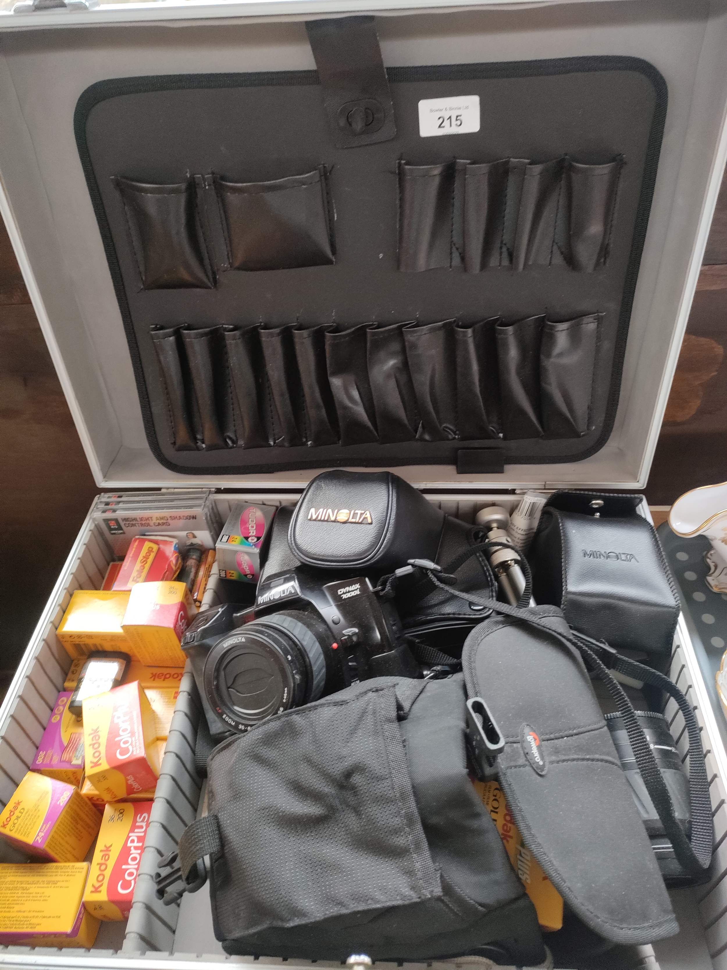 Minolta camera with accessories fitted in a case