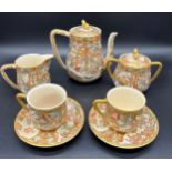 Antique Japanese Satsuma highly decorative and hand painted tea for two set. All items are