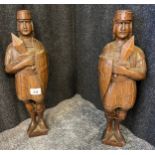 A pair of 19th century left and right hand carved oak centurion figures- possibly from a piece of