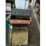 Box of lord of the rings display stands and folders