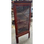 Antique Mahogany corner cabinet on pedestal legs