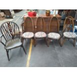 Set of 4 ercol chairs together with wheel back chair