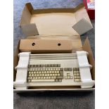 Vintage Commodore Amiga 1200 console with box.