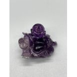 Antique Chinese hand carved sculpture of a sitting buddha- carved from an amethyst stone. [4cm high]