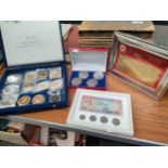 Selection of British commemorative coins, gold bank note etc