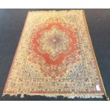 An Asian Style Rug with Floral Design, measuring L 365 x W 275 cm.